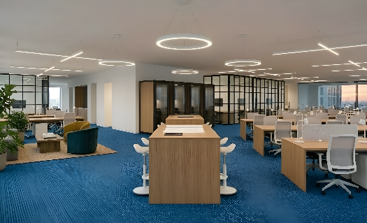 Open-plan corporate office with modular workstations, phone booths and blue carpet — pan-India installations by Ezeefit Office Systems