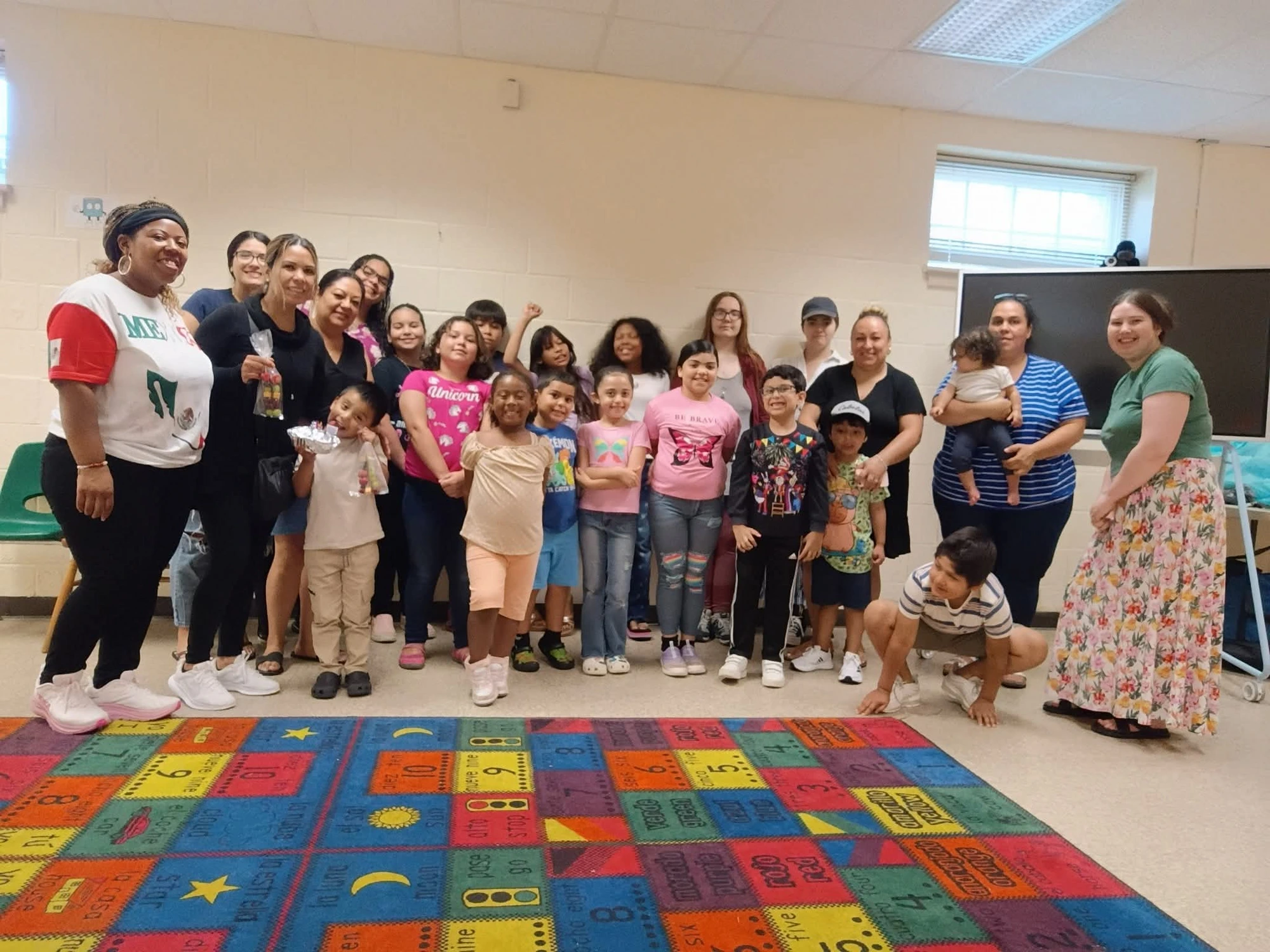 Children and families at a Bilingual Exploradores community program