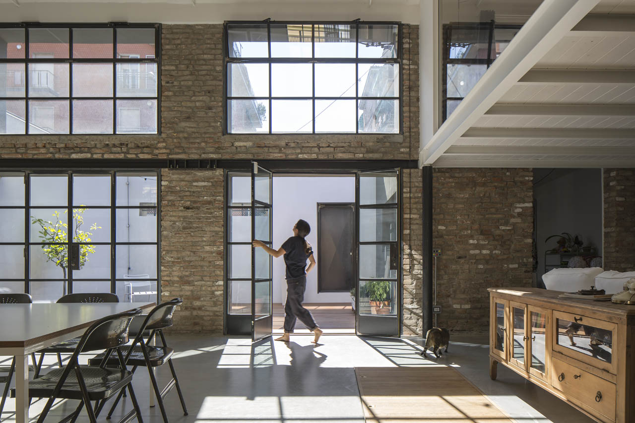 Loft interior with steel-framed industrial windows