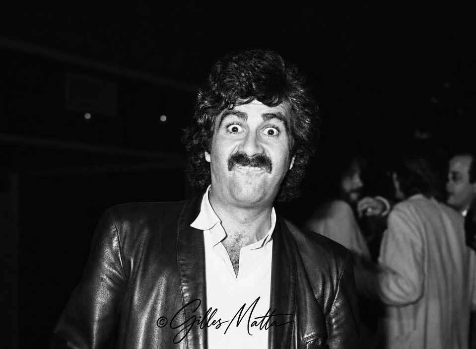 Roland Magdane , grimace .