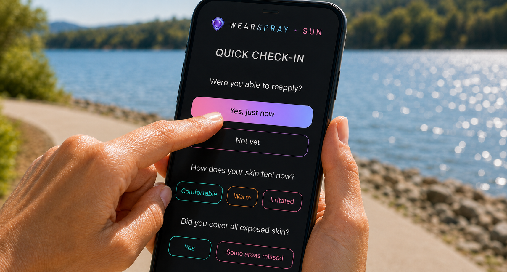 A woman by the lake glancing at the WearSpray Sun app doing a quick check-in, as the system learns her routine
