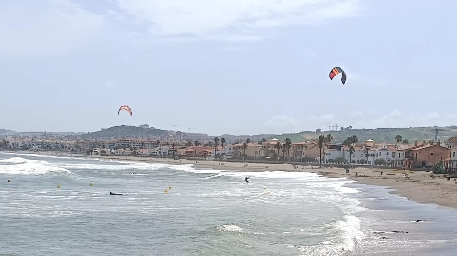Beach between Casares Costa and Sabinillas with kitesurfers